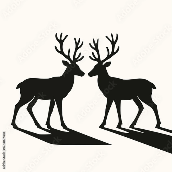 Fototapeta Silhouette of two reindeer facing each other