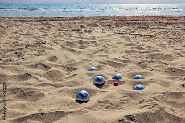Obraz Petanque balls on the sandy beach