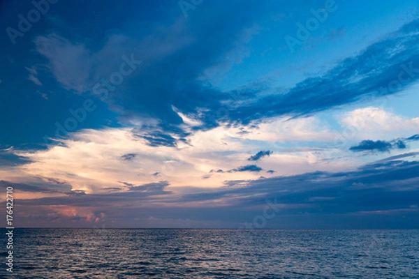Obraz Dramatic clouds at sunset over the mediterranean sea