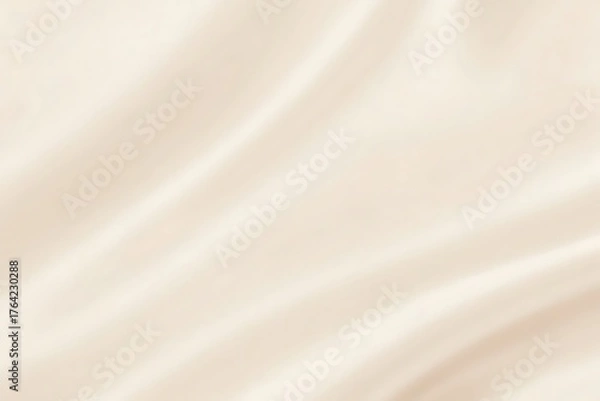 Fototapeta Softly draped cream fabric with subtle pink undertones creating elegant flowing lines and gentle shadows for a luxurious background