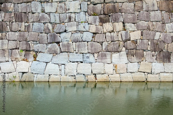 Fototapeta 大名の刻印が刻まれた大阪城南外濠石垣