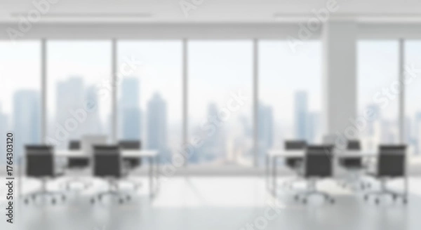 Fototapeta Blurry empty modern open plan office interior with rows of desks and large window with city view for corporate or coworking space background