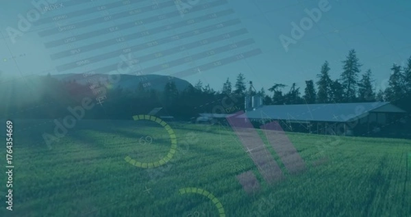 Fototapeta Showing sunlit rural meadow featuring metal-roofed barn and silos on right, with digital overlay