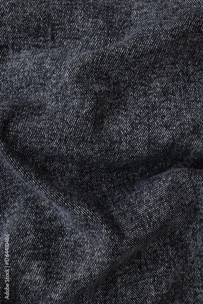 Fototapeta Denim dark gray background. Top view. Vertical image
