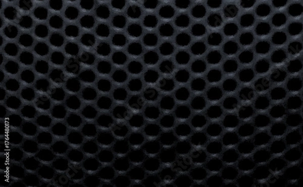Obraz たくさんの黒い色の円の穴があいた模様でデザインした背景、壁紙、テクスチャ