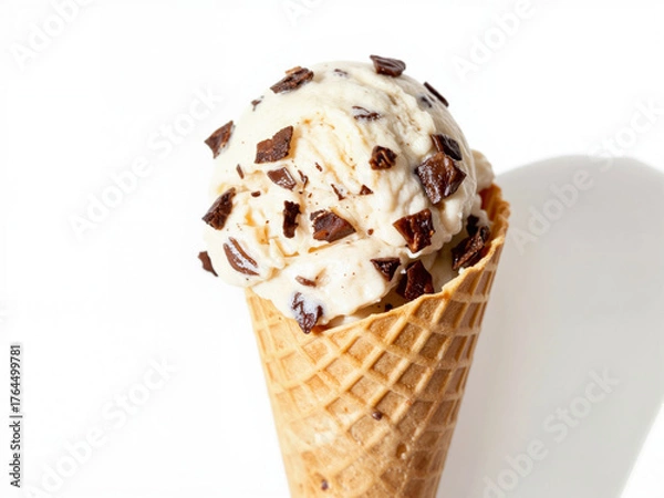 Obraz A scoop of stracciatella gelato with visible chocolate flakes Ice cream cone with chocolate chunks on white background  