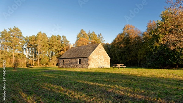 Obraz Hairy Nicols Cottage at the Far end of Crombie Park and Reservoir, near to Dundee on a late sunny afternoon in October.