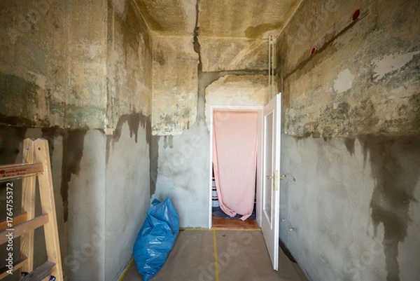 Fototapeta Open interior space with exposed red brick, combining raw materials and industrial charm