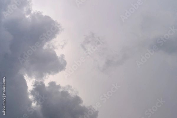 Fototapeta A Stunning Heartshaped Cloud Formation Against a Dramatic Grey Sky, Capturing Emotions