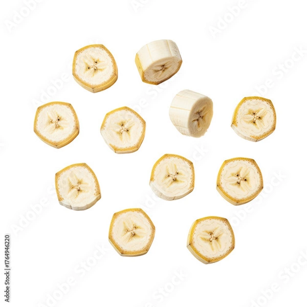 Fototapeta Sliced yellow bananas on a stark black background