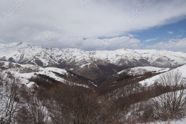 Obraz Mountain valley with snowy peaks and bare trees, Lori, Armenia