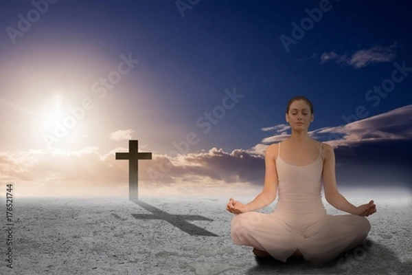 Fototapeta Composite image of peaceful woman in white sitting in lotus pose