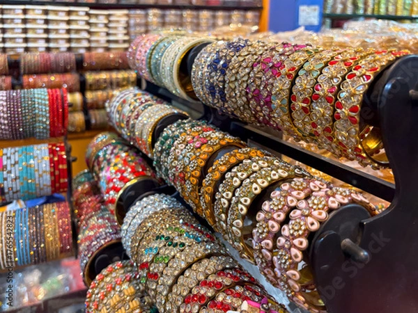 Fototapeta collection of traditional Indian bangles, bangles of colorful and different materials on sale store 