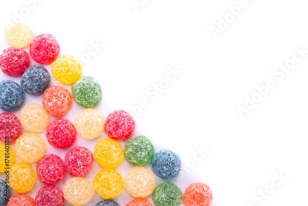 Fototapeta diagonal of colorful jelly beans in different flavors with copy space 
