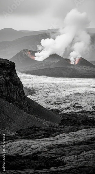 Fototapeta Volcanic eruption with glowing lava and smoke billowing from the crater in a dramatic landscape