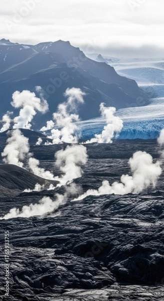 Fototapeta Geothermal steam vents rising from volcanic rock near a glacier in icelands highlands