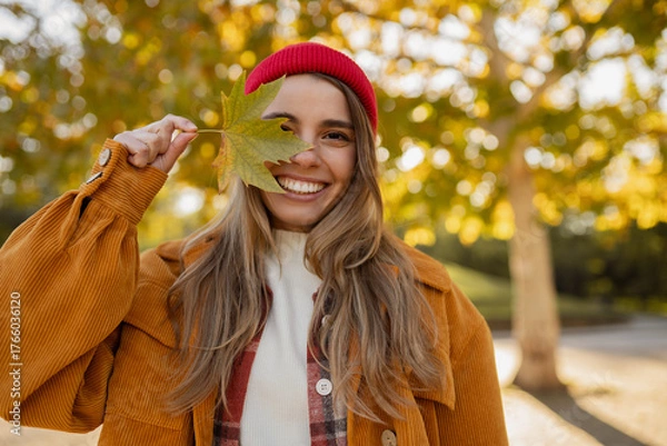 Obraz young attractive blond woman walking in autumn park, stylish , smiling
