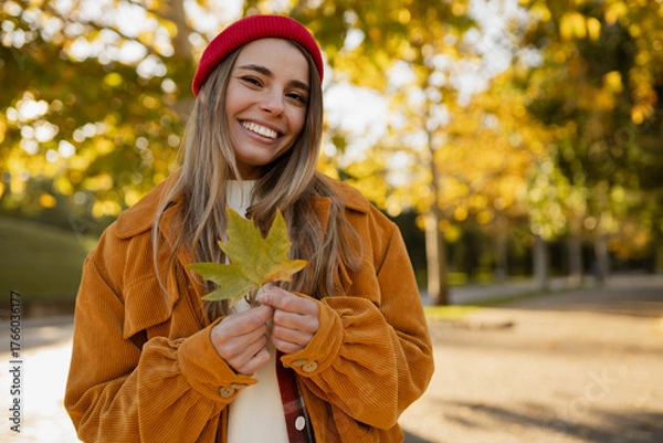 Obraz young attractive blond woman walking in autumn park, stylish , smiling