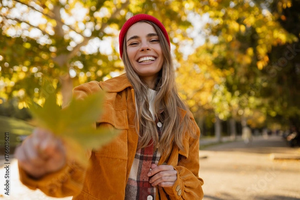 Obraz young attractive blond woman walking in autumn park, stylish , smiling