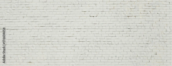 Fototapeta Brick wall painted with white paint.
