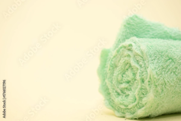 Obraz Rolled mint green towel for spa use