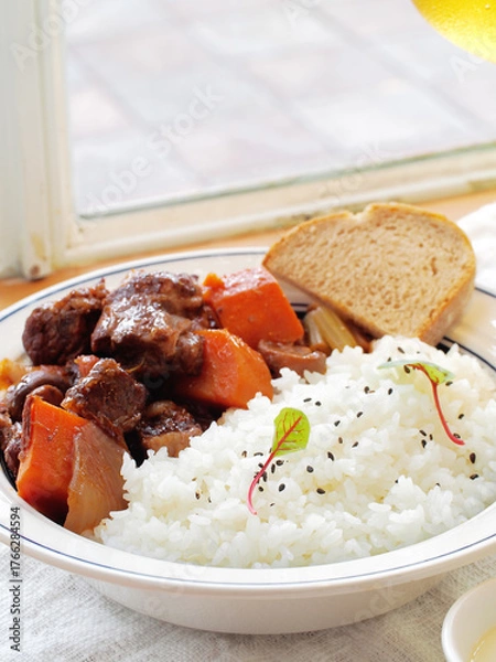 Fototapeta Red wine braised beef ribs with rice in white plate  