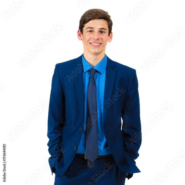 Obraz Portrait of a handsome cheerful teenager in a suit on a white background