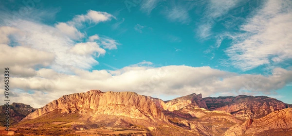 Fototapeta View of the mountain valley with the beautiful Mount Roc de Rombau. The Pyrenees Mountains. Peramola, Lleida, Spain. Horizontal banner
