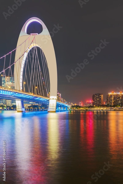 Fototapeta The skyline of urban architecture and the night view of the ancient canal in Guangzhou, China