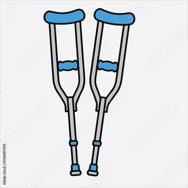 Fototapeta A pair of blue-topped crutches with metal frames and blue accents on a white background in a flat lay.