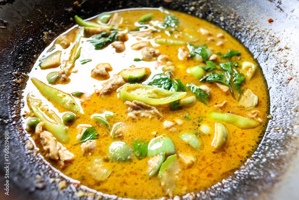 Fototapeta Thai food. Chicken green curry with eggplant.