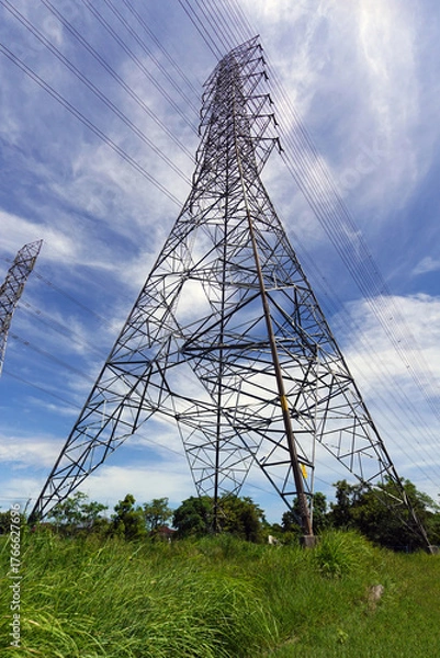 Fototapeta A large steel structure of a high-voltage power pole