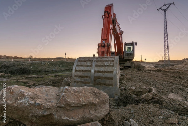 Obraz Heavy machinery for the construction of a road in Spain