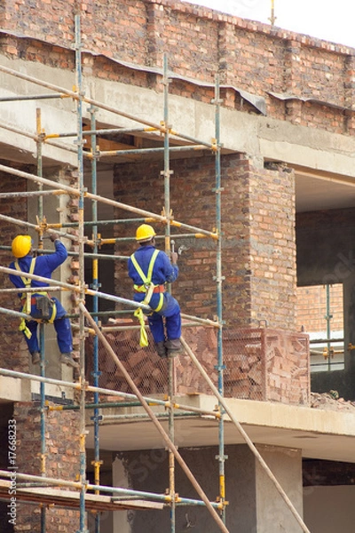 Fototapeta Men working on site