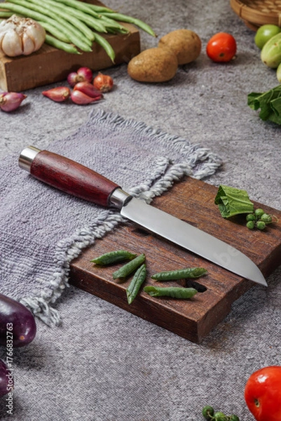 Fototapeta photo of a kitchen knife specifically for cutting vegetables and fruit, mirror and satin knife material