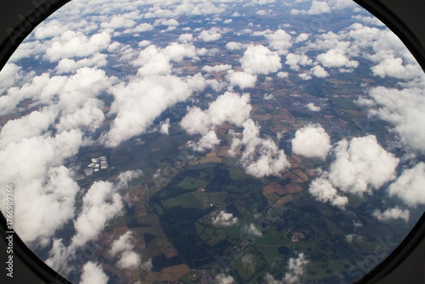 Fototapeta Clouds on a plane