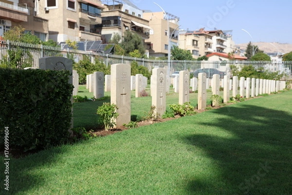 Fototapeta Graves of over 1,200 soldiers from the United Kingdom at the British Commonwealth War Cemetery in Damascus, Syria, who lost their lives during World War I and World War II.