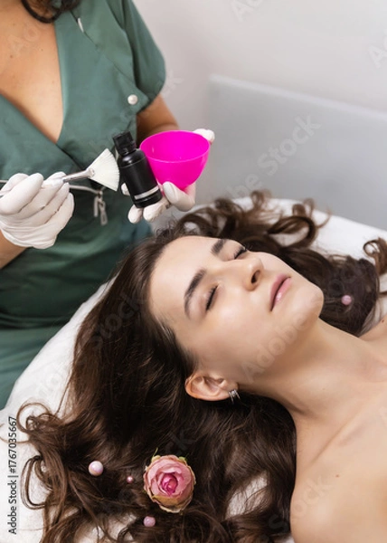 Obraz young woman in beauty salon with facial procedure
