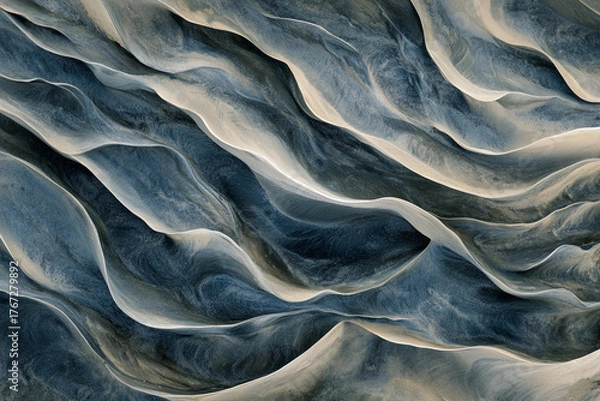 Fototapeta Aerial view of undulating sand dunes with flowing, rhythmic textures