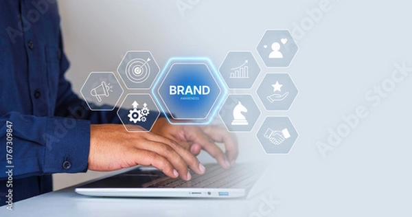 Fototapeta Brand awareness strategy concept, businessman planning digital brand awareness, communication, target, Marketing growth icons, customer loyalty, and partnership symbols for corporate branding success