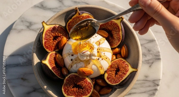 Obraz Delicious burrata cheese with figs and honey for a balanced dessert