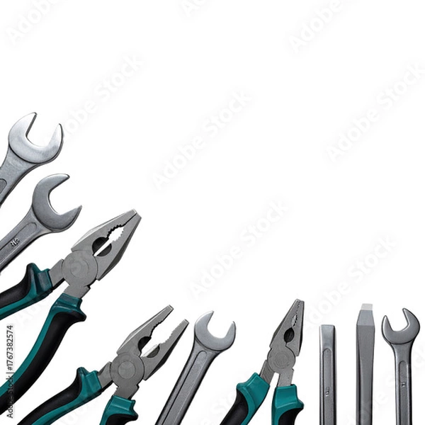 Obraz Tools like wrenches and pliers lay angled at the bottom-left corner, on a black background