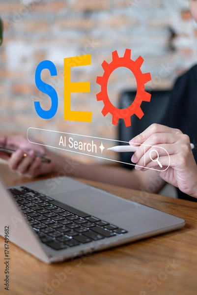 Fototapeta Businessman using laptop analyzing seo search engine optimization website data analysis to boost search result global research technology keyword network content online information social marketing