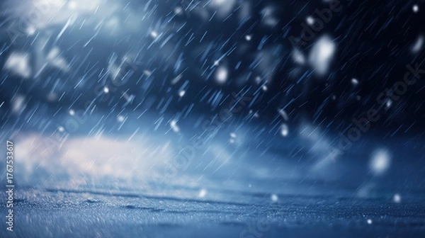 Fototapeta precipitation. Softly falling snowflakes in a winter scene with a cool blue atmospheric glow. travel magazines, destination branding, designed for outdoor magazines and nature guides.