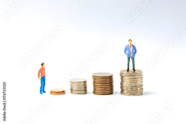 Fototapeta Concept for success ladder Miniature people: Small business figure standing on stack of coin. Money and financial concepts