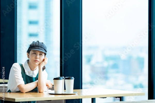 Obraz 落ち込むカフェスタッフ