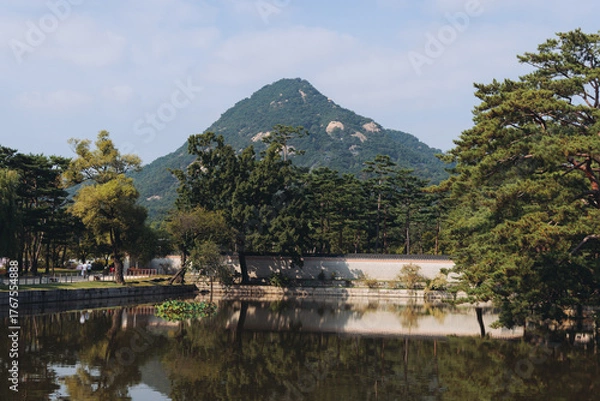 Fototapeta Gyeongbokgung Palace, Seoul, Jongno District, South Korea, in a spring sunny day, exterior view of main Korean royal palace with Bugaksan mountain in the background, museum and palace