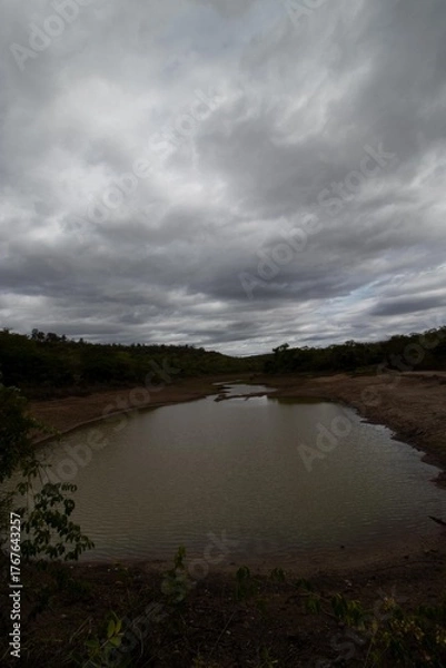 Obraz Beautiful lagoon with clouds in the sky and the look of rain, located in the city of Turmalina, MG.