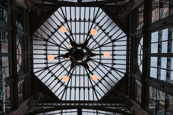 Fototapeta glass and steel ceiling with chandelier from below in the city of Genoa