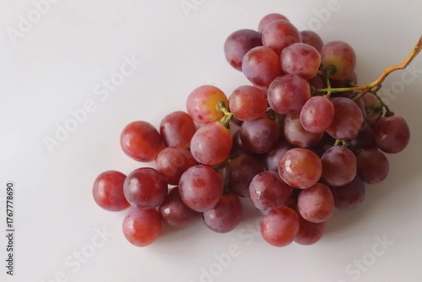 Fototapeta Fresh Red table grapes, likely Red Globe, Crimson Seedless, or Flame Seedless